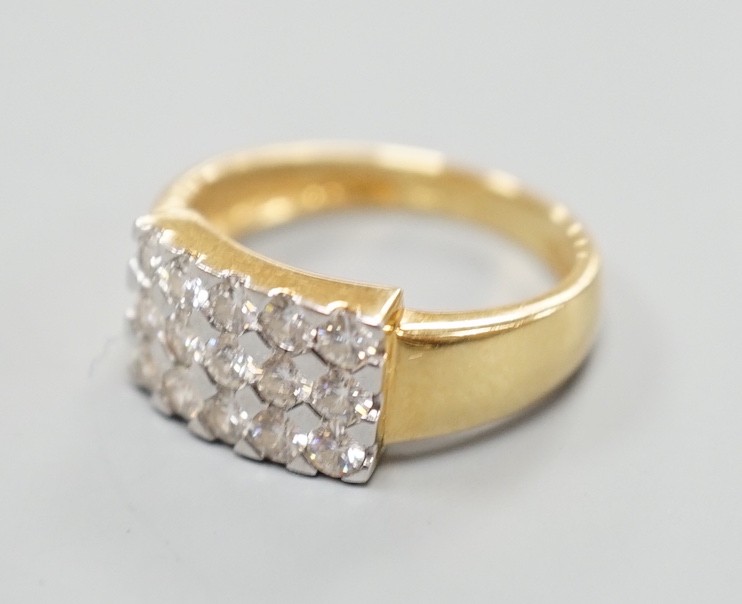 A modern 18ct gold and pave set diamond cluster ring, size K, gross weight 3.9 grams.